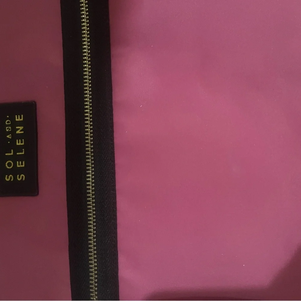 Sol and Selene Hot pink laptop bag.